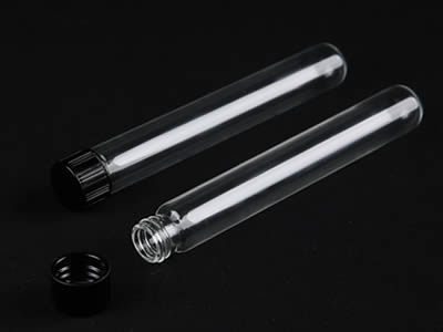 A closed and an opened glass test tube with black color plastic screw stopper on the black background.