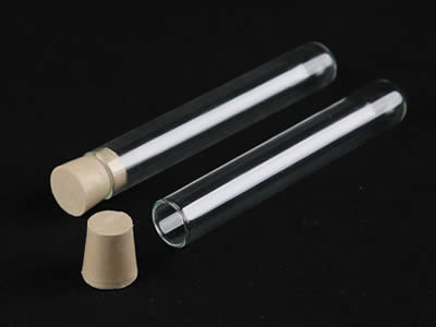 A closed and an opened glass test tube with rubber stopper on the black background.