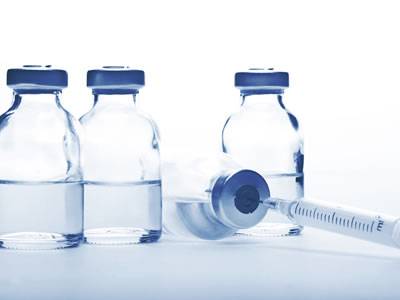 Four glass vials for injection liquids