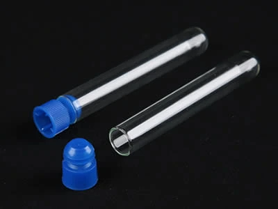 A closed and an opened plastic laboratory culture tube with plastic stopper on the black background.