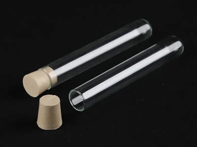 A closed and an opened laboratory culture tube with rubber stopper on the black background.